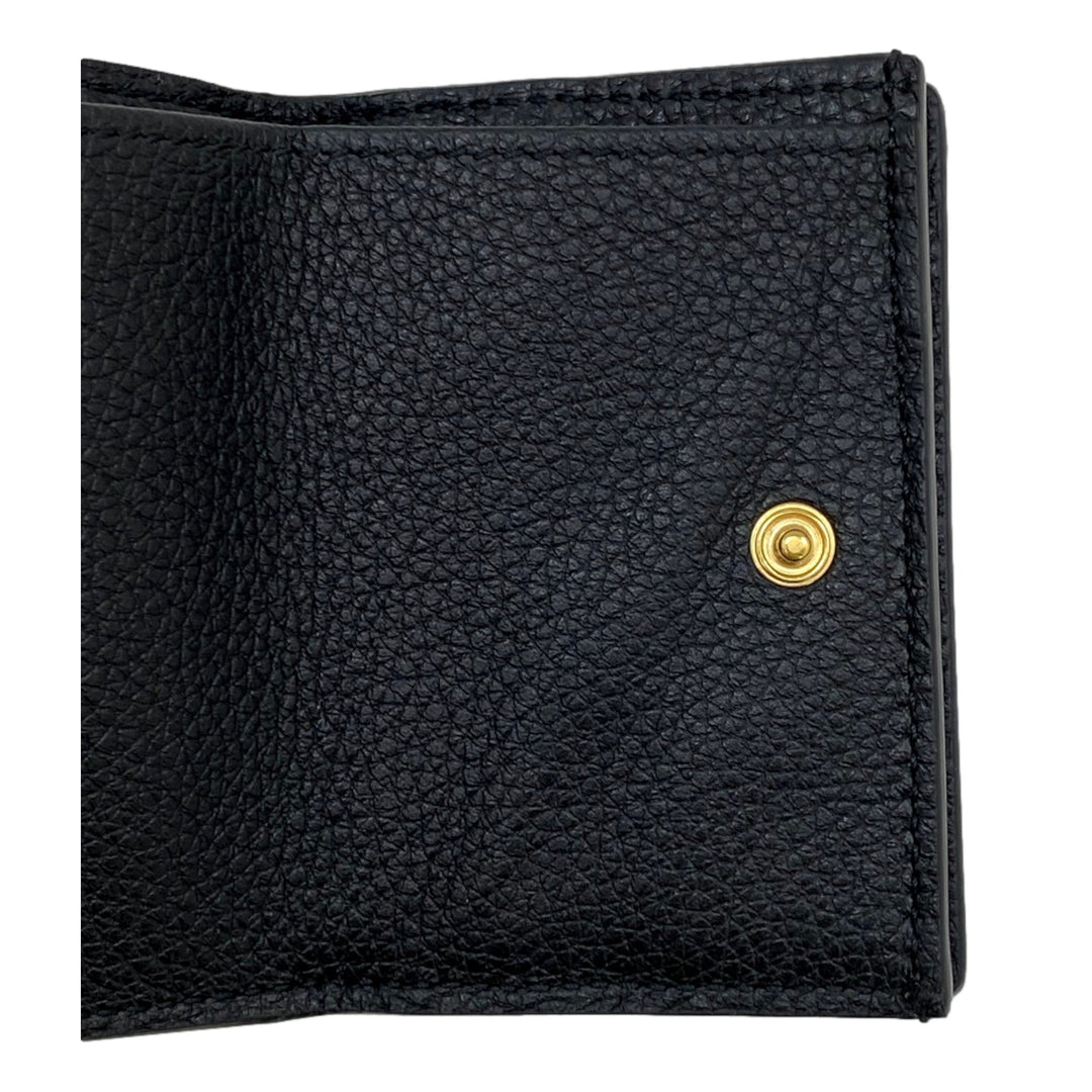 Gucci Embossed Logo Mini Tri-Fold Wallet Black Pebbled Leather