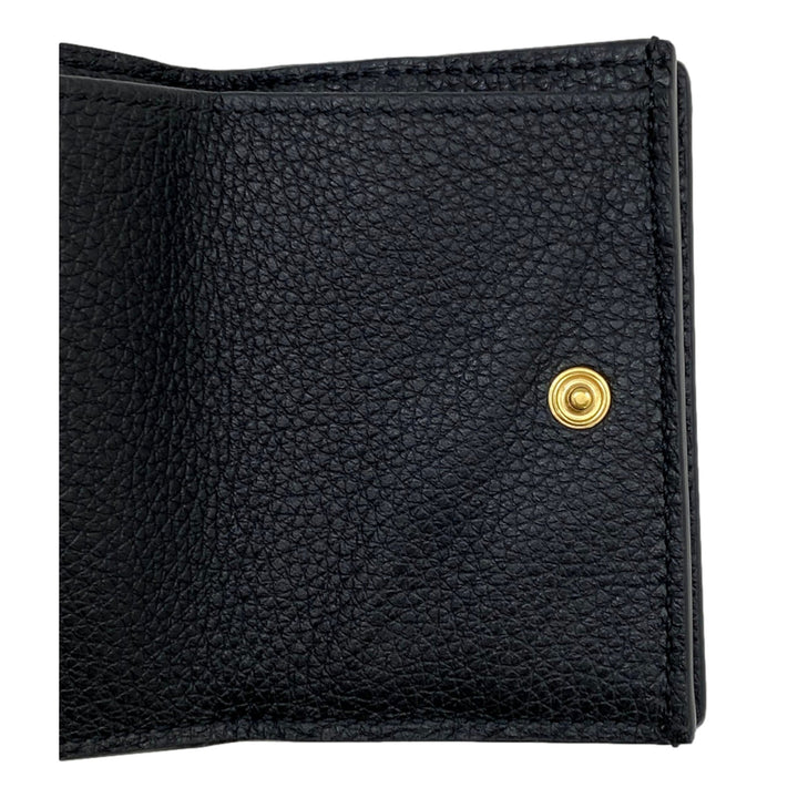 Gucci Embossed Logo Mini Tri-Fold Wallet Black Pebbled Leather