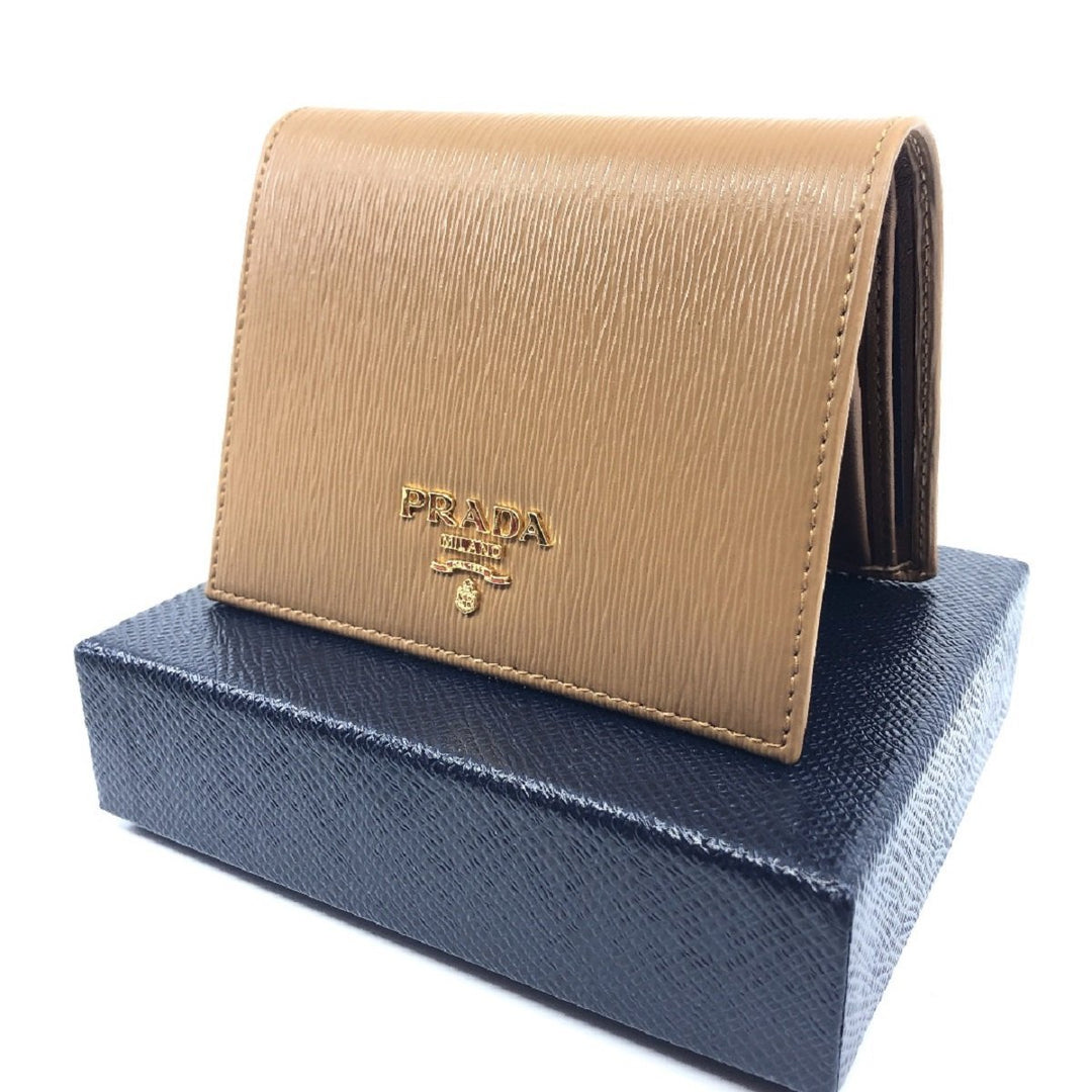 Prada Vitello Move Small Vertical Caramel Beige Leather Flap Wallet